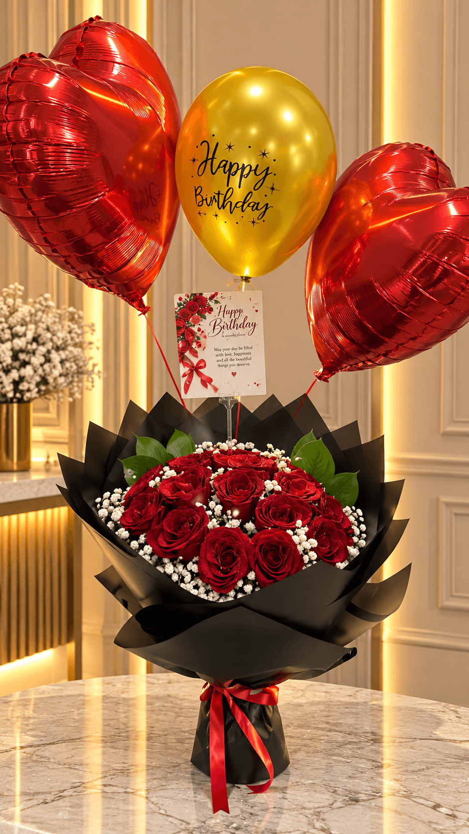 15 red roses bouquet with black wrapping, red heart balloons and gold Happy Birthday balloon – InstaFlowers UAE
